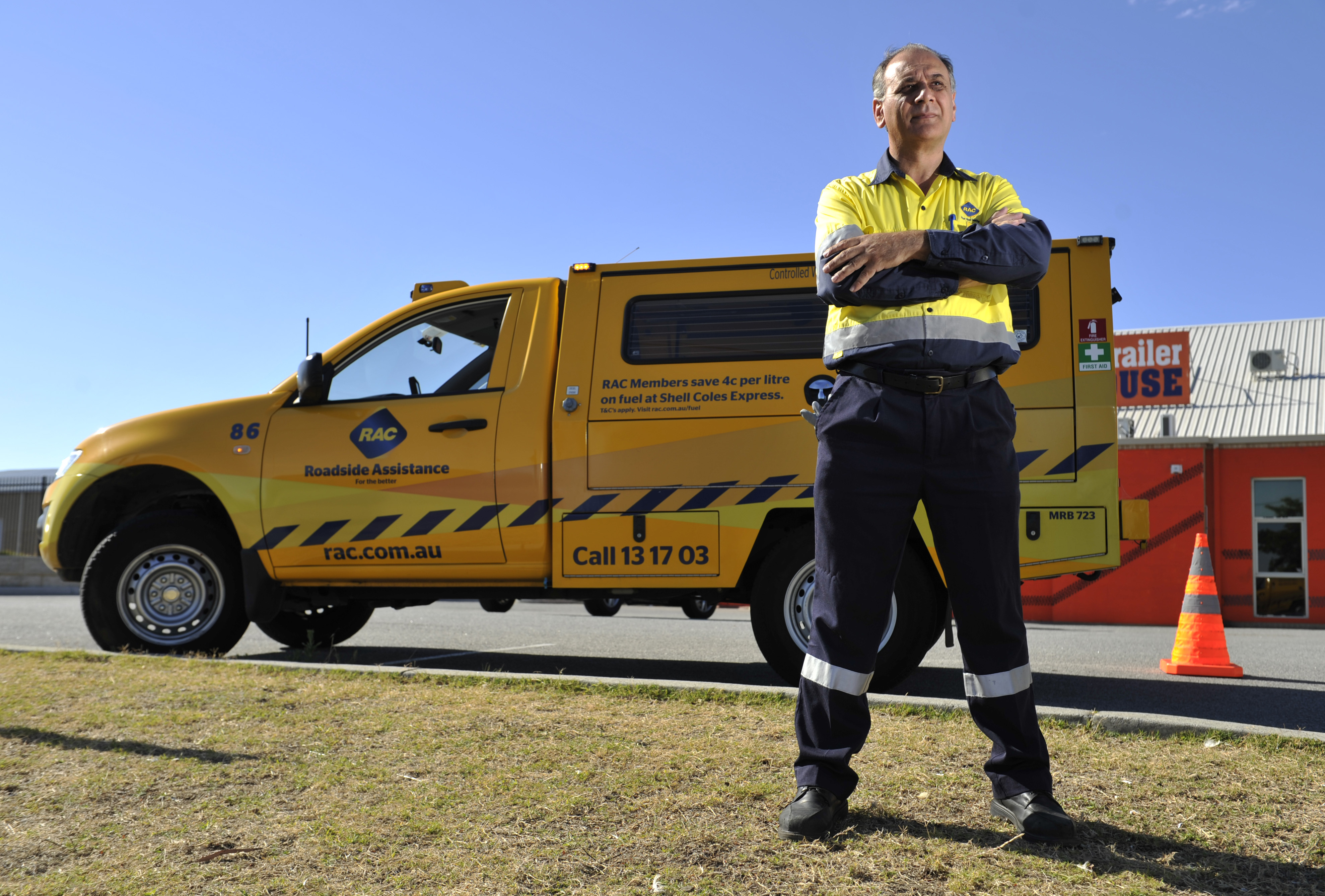 RAC patrol standing in front of his patrol van.