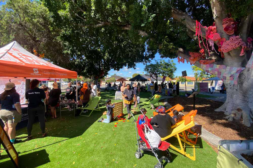 A brightly coloured marketplace on a sunny day in Gnalla Plaza