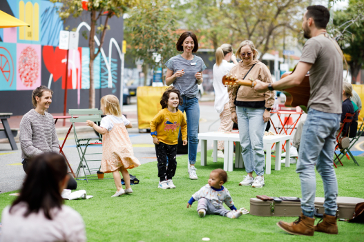 People enjoying live music outdoors