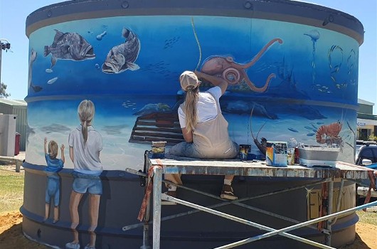 Ocean life mural being painted at Shire of Coorow Reconnect project