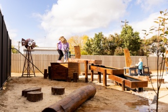 Children playing in nature play