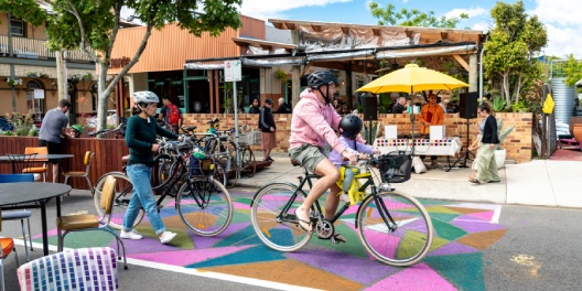 Family riding through bike hub