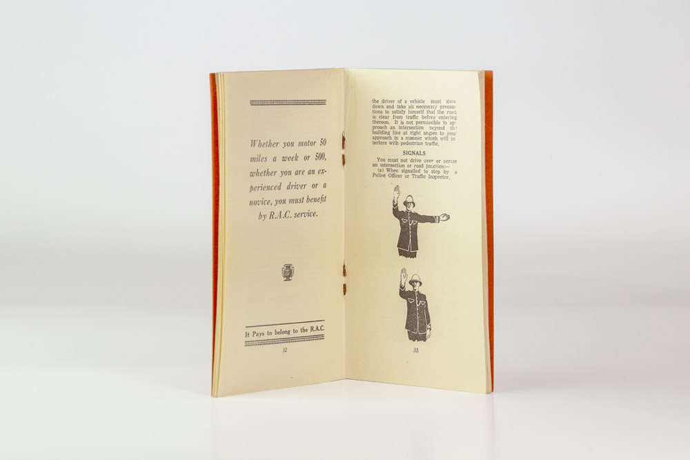 Pages 32 and 33 of the Road Safety pamphlet. Page 32: An RAC advertisement encouraging readers to become RAC members. Page 33: Final paragraph on best practices for intersections, followed by introducing hand signals from Police Officers and Traffic Inspectors.