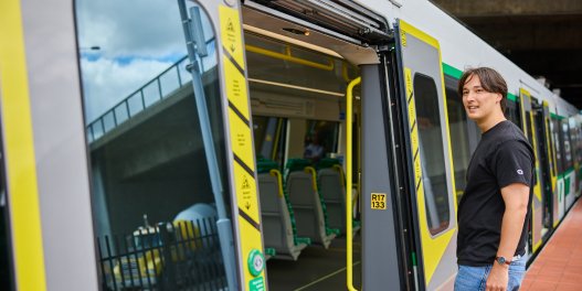 Man boarding public train