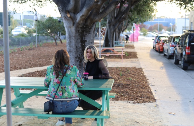 Ladies sitting on park bench