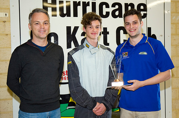 James and Peter Hill holding their winning trophy