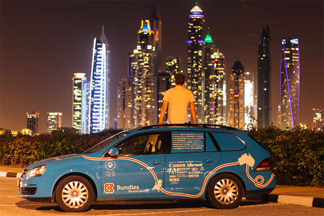 Wiebe Wakker sitting on his EV in Dubai