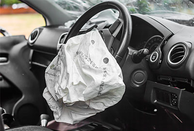 An airbag deployed after a car accident