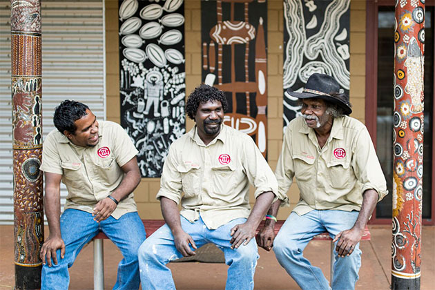 Lachlan Raymond, Matthew Ningarmara, and Ted (Yumbun) Carlton from Waringarri Aboriginal Arts Centre
