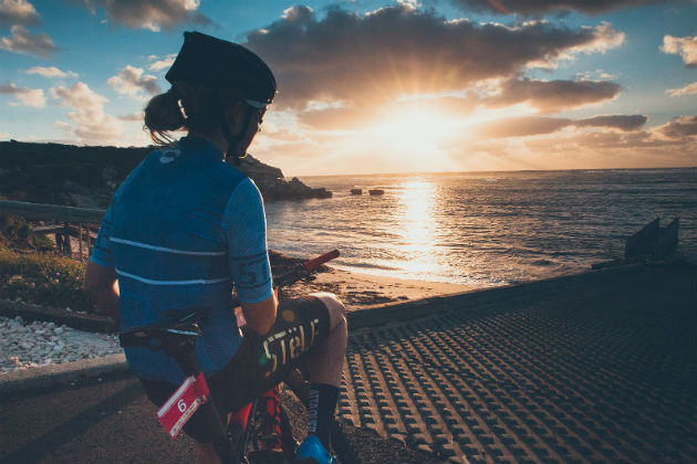 Mountain biker watching the sunset