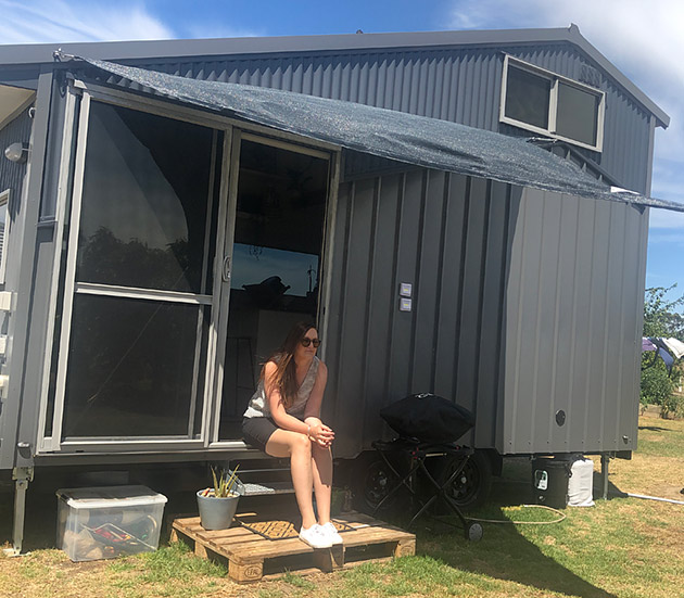 Ashlee De Campo outside her tiny home