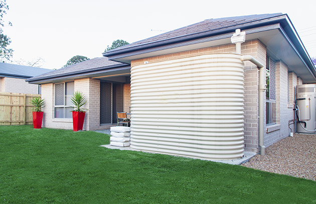 Rainwater tank outside a home