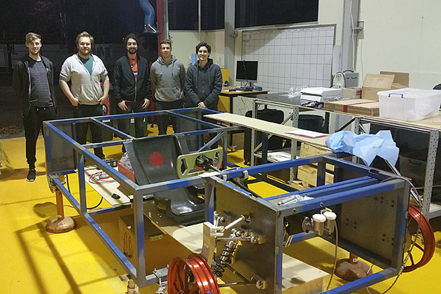 Australian team members with the test rig