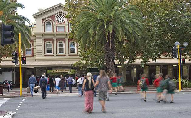 Commuters outside Perth train station