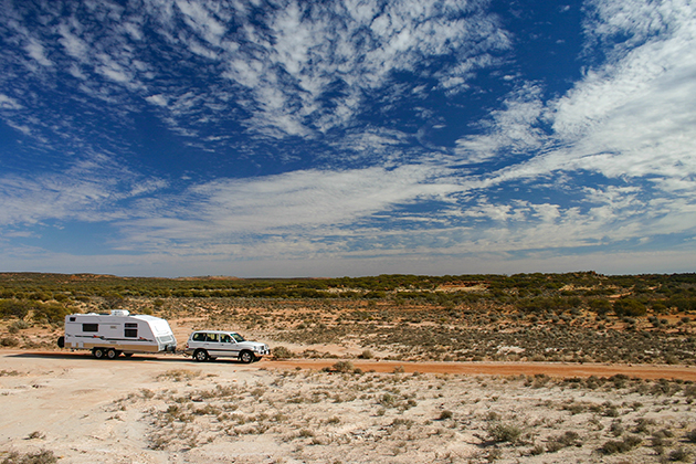 Image of van travelling through outback