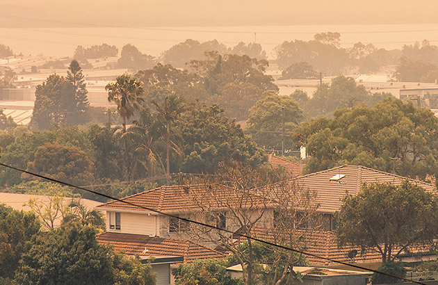 Bushfire burns near suburban homes