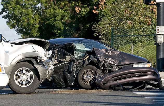 Head-on collision between two cars