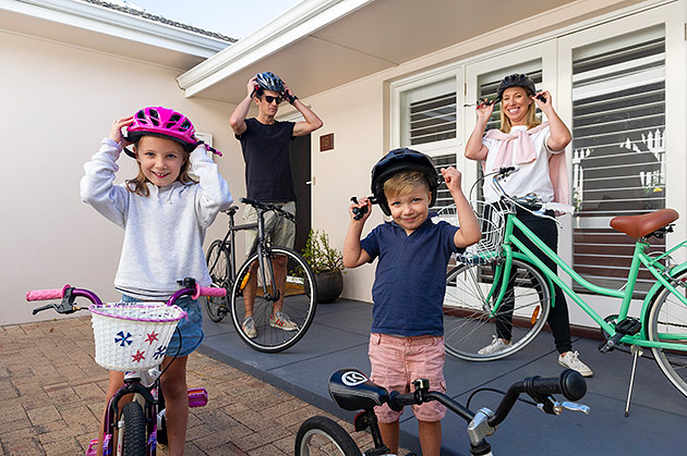 Ashton family getting ready for a bike ride