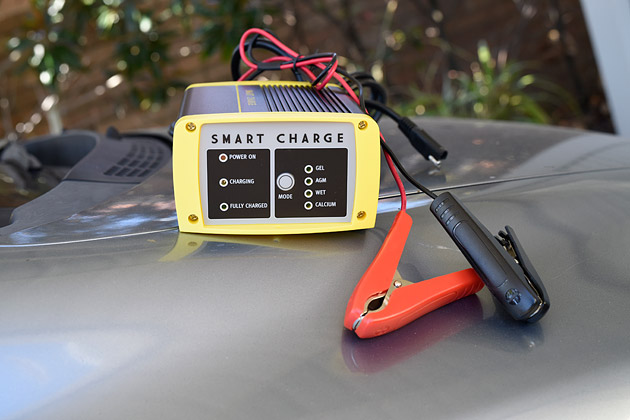 Smart battery charger on car bonnet