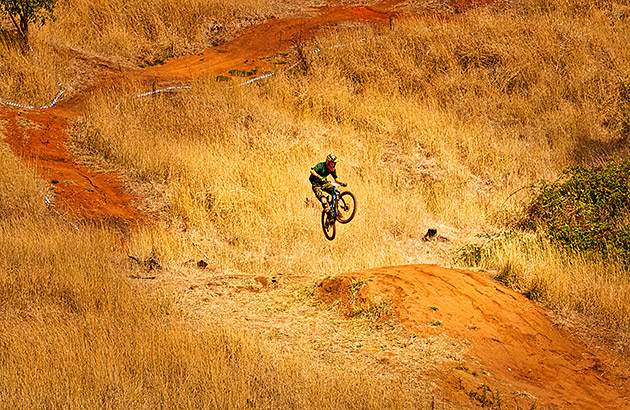 Mountain bike rider on a trail at Ling Longa mountain bike park