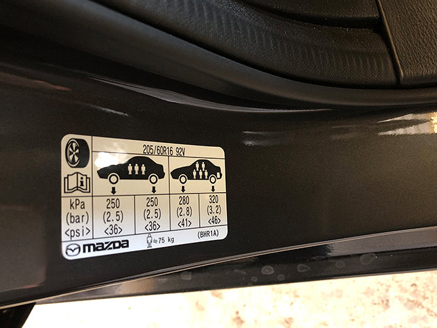 Tyre placard inside car door