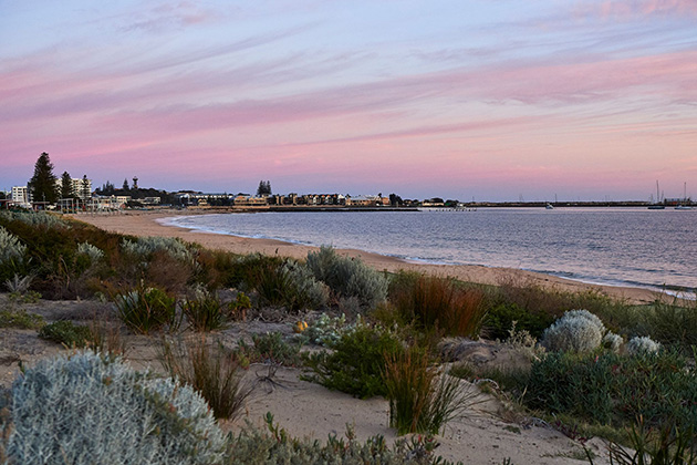 Pink sunset over beach