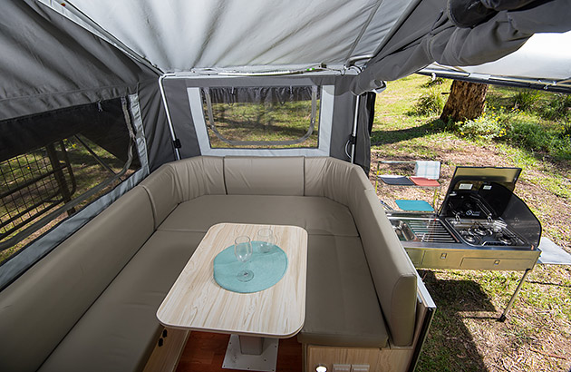 A kitchen table in a camper trailer