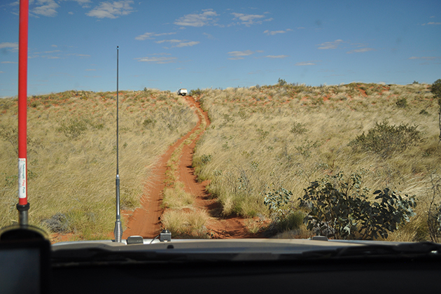 View of dirt track from car windscreen