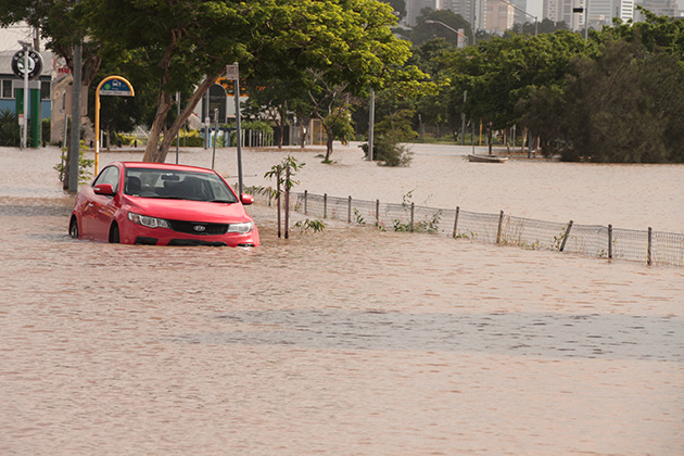 Car driving on flooded road