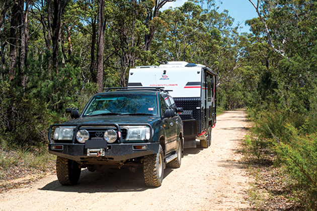 Image of a caravan in forest