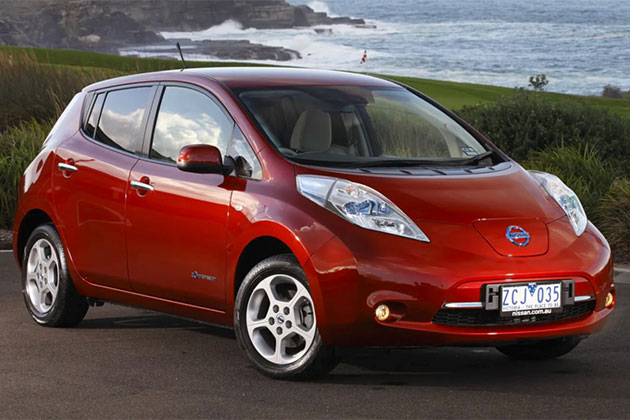 Nissan Leaf ZE0 in front on the sea