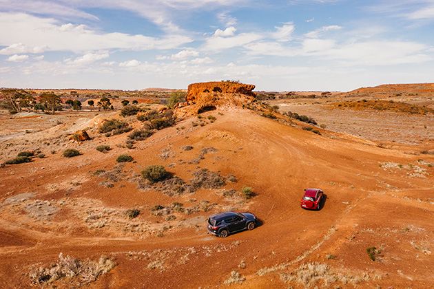 Cars driving up a hill