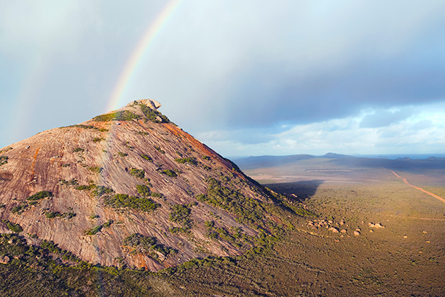 Mountain with a rainbow in the background