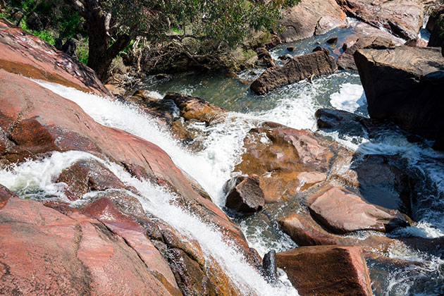 Water falling down rock face