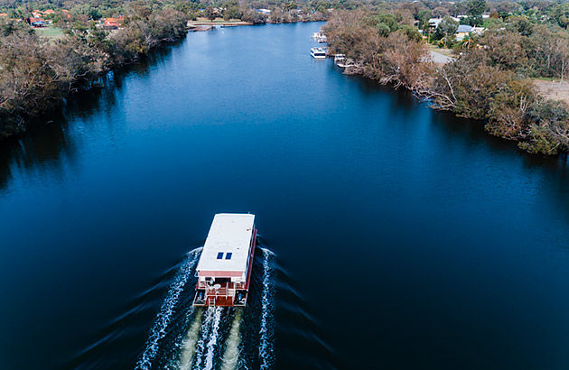 Houseboat along waterway