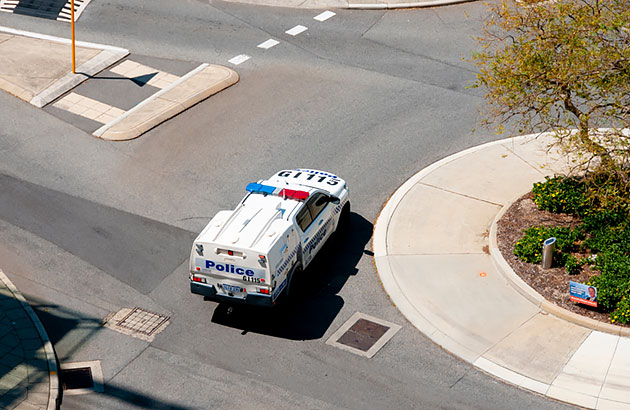 Police car at a roundabout