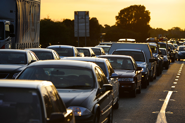 Cars in congestion at dusk