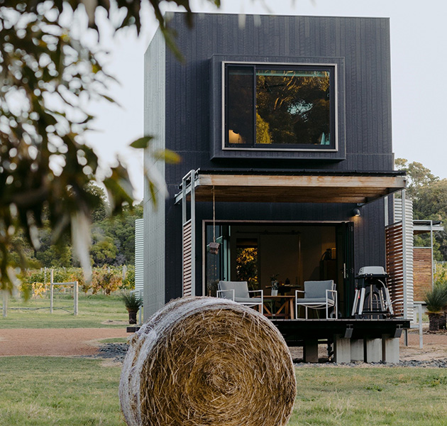 Outside of a barn with hay