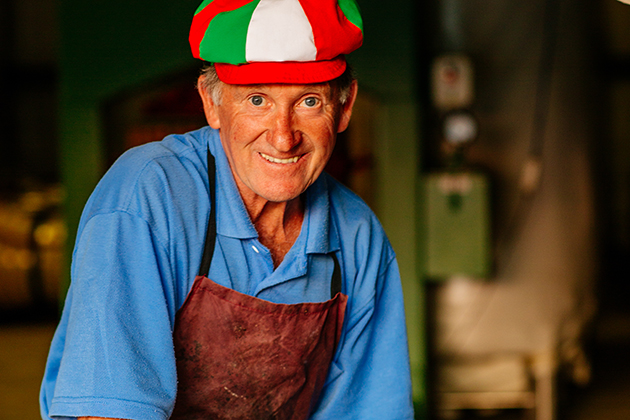 Man smiling with a hat on