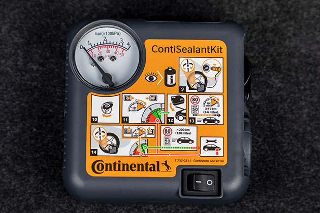 Plastic box showing instructions and a pressure gauge