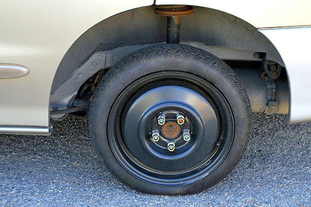 Small space saver tyre on a car