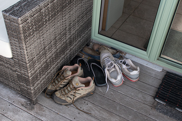 Group of shoes outside front door