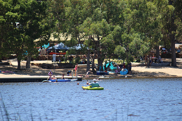 People paddling on a lake
