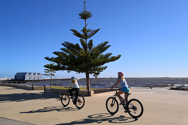 Image of people cycling along foreshore