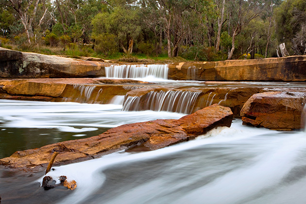 Waterfall flowing over rocks