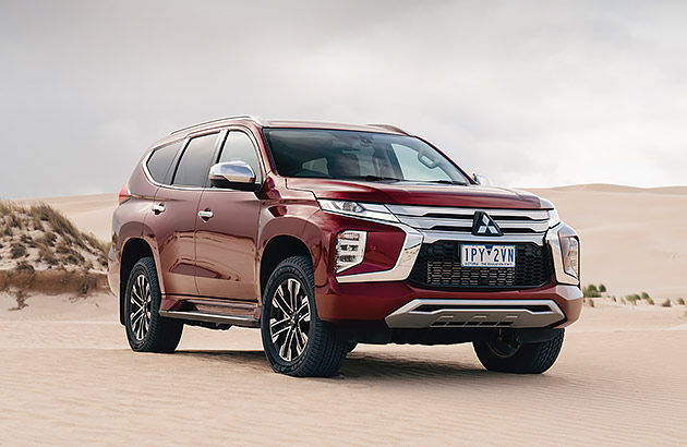 A Mitsubishi Pajero Sport in a desert landscape