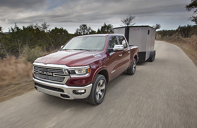 A RAM 1500 towing a trailer