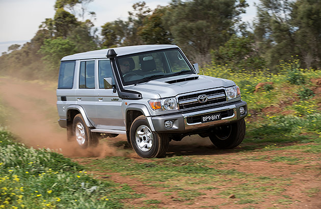 A Toyota Landcruiser 70 series on a dirt road