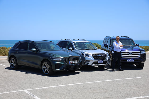 RAC's Alex Forest with a Genesis, Subaru and Toyota car