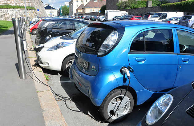 Electric cars charging on a street on Oslo